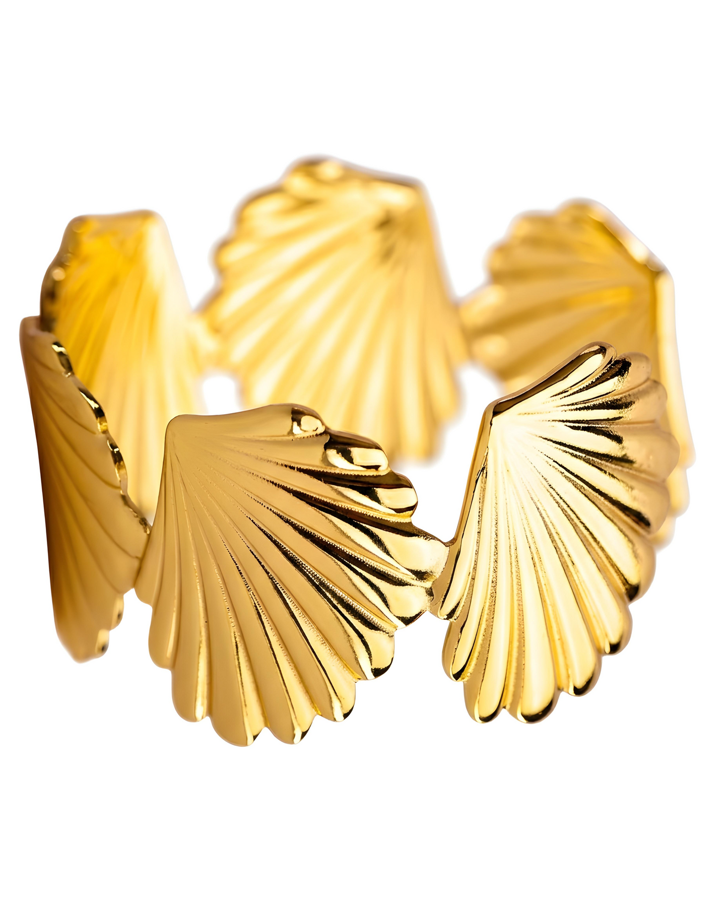 Gold shell-shaped bracelet on a white background